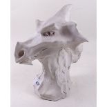 A studio pottery model of a dragons head, seal mark to base - 22cm high