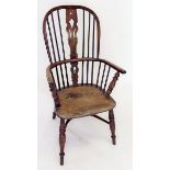 A 19th century yew and elm Windsor chairs with crinolene stretcher