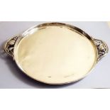 A sterling silver circular tray with two bud handles by Georg Jensen, 26oz - 28cm
