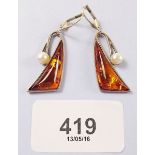 A pair of silver, amber and pearl earrings