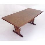 An oak refectory style dining table