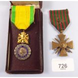 A French Croix de Guerre medal and a Medaille Militaire, boxed