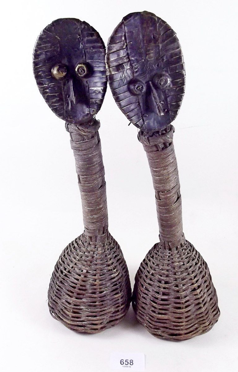 A pair of South African metal woven reed rattles