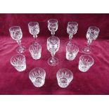 A set of six cut glass wine glasses and a set of six tumblers