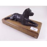 A bronze finish Labrador on oak base