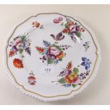 A 19th century Derby white porcelain plate painted sprays of flowers