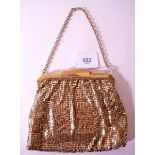 A Whiting and Davis gilt mesh evening bag