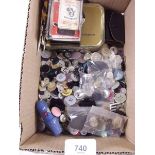 A box of sewing equipment including silver and enamel thimble, buttons etc.