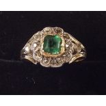 A Victorian emerald and diamond cluster ring