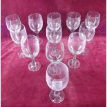 A set of twelve large glass wine goblets