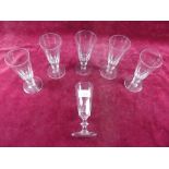 A set of six early 19th century cut glass wine flutes