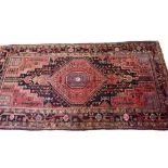 A Persian Hammadan Lori Village rug on blue ground - 272 x 142cm