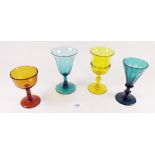Two Victorian green wine glasses and two yellow ones