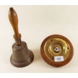 A mahogany and brass door bell push and an old school hand bell