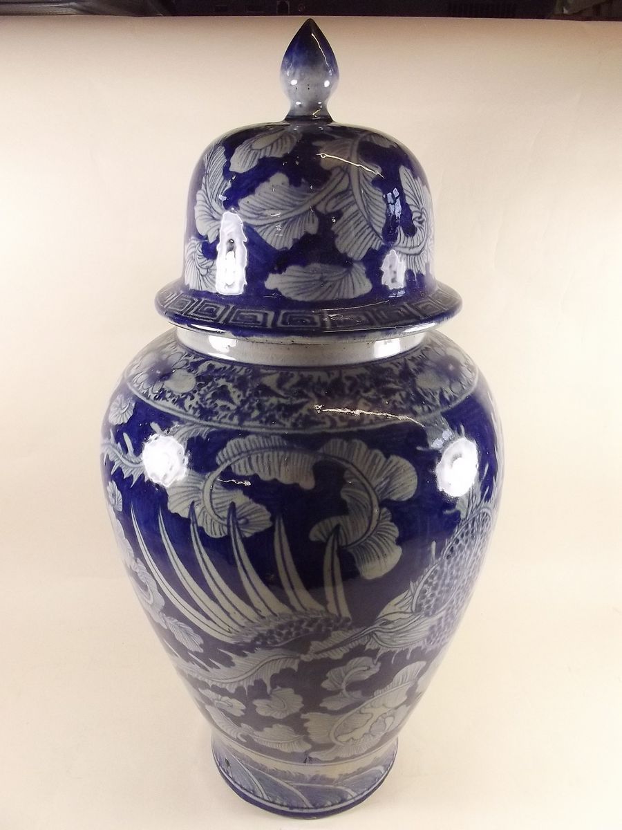 A large blue and white Chinese stoneware reproduction vase and cover - 56cm