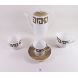 A Wedgwood Susie Cooper coffee service 'Old Gold Keystone' comprising: coffee pot, jug, sugar and