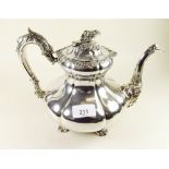 A large Victorian silver plated bombe form teapot with floral, foliage and shell decoration