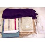 A bag of old crepe and satin fabrics, tapestry panels etc