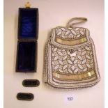 An Edwardian cream and gilt beaded evening bag, a leather coated bangle box and a pair of buckles