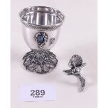 A decorative 925 silver eggcup set turquoise and a silver miniature group of two doves