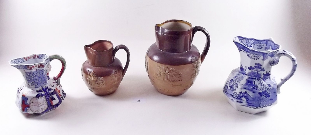 A Victorian Davenport Imari jug, a Masons blue and white jug and two Doulton Stoneware jugs