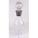 A cut glass decanter with silver collar - Sheffield 1985