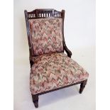 A Victorian spindle back small upholstered chair