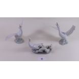 A Lladro pair of geese and duck and duckling group