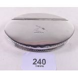 A Sheffield plated oval snuff box with hinged lid engraved arrow crest