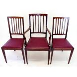 A set of six Edwardian mahogany crossbanded dining chairs with drop in seats (two carvers and four