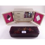 A 1960's musical jewellery box and a lacquer glove box