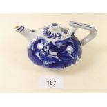 A late 19th century blue and white teapot painted fish, with six character mark to base, 14cm long