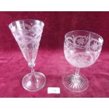 A large Victorian etched glass goblet and a similar wine flute