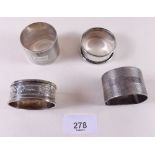 Four silver napkin rings, 3.5ozs