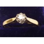 An 18 carat gold diamond solitaire ring
