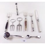 A group of Victorian silver plated cake prongs, a cake knife and a tody ladle