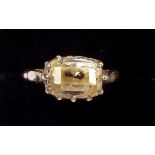 A 9 carat gold ring set yellow sapphire, mount a/f