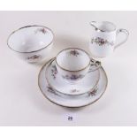 A Heathcote floral printed tea service comprising: four cups and saucers, five tea plates, jug and