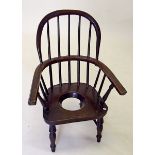 A Victorian childs Windsor potty chair with hole to seat, (from Northumberland)