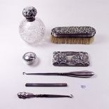 A Victorian silver cut glass scent bottle and various silver dressing table items