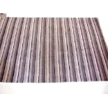 An Indian contemporary striped rug - 294 x 185cm