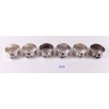 A set of six silver napkin rings with rocking horse motif - London 2008, 2.9ozs