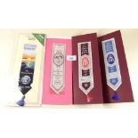Four Cash's silk woven bookmarks