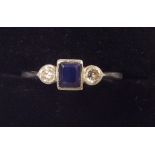 An 18 carat white gold and platinum set sapphire and diamond ring