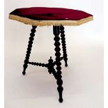 A Victorian octagonal gypsy table on bobbin supports