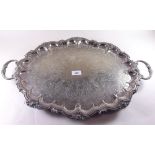 A large oval engraved silver plated tray