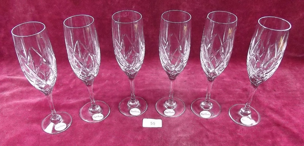 A boxed set of six Brierley cut glass champagne glasses