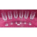 A boxed set of six Brierley cut glass champagne glasses