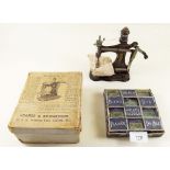 A Somes & Richardson child's sewing machine and a Gem button box