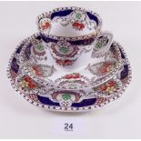 An Edwardian tea service decorated swags comprising four cups and saucers, four tea plates and two
